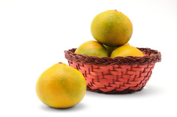 Yellow-green tangerines on a white background