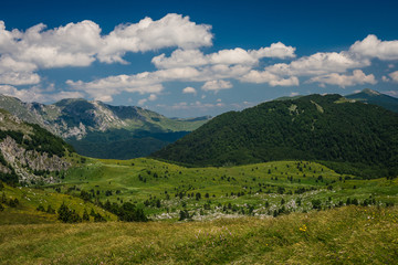 Naklejka na ściany i meble Mountain view in Bosnia and clouds 