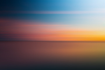 Obraz premium Abstract blurry dramatic Sunset in Long Exposure for background