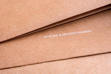 Reuse background. Words on craft paper. Recycle icons on brown paper. Give me a second chance....