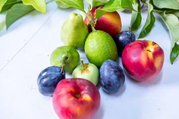 Some summer fruits collection with their leaves
