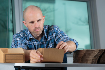 a man working with boxes
