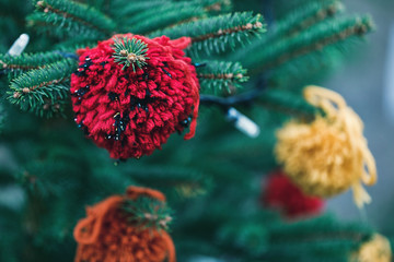 DIY yarn decoration on a Christmas tree