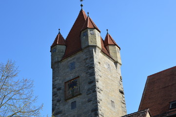 Fototapeta na wymiar Rothenburg (Germany) April 2017. The old city, surrounded by walls and towers. 