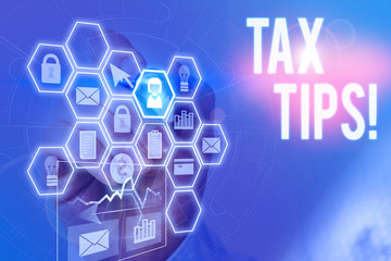 Fototapeta premium Handwriting text writing Tax Tips. Conceptual photo compulsory contribution to state revenue levied by government Picture photo system network scheme modern technology smart device