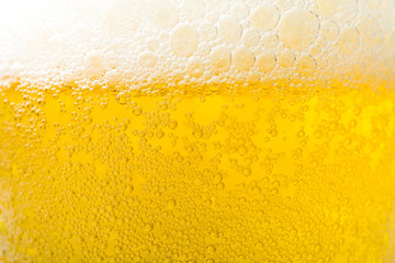 Background  texture of frosty beer with foam and bubbles