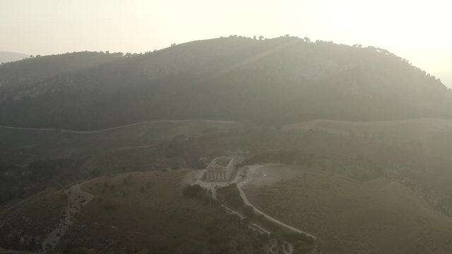 Aerial view of ancient temple standing on the high hill in Athens in Greece. Action. Temple of Olympian is also known as the Columns of the Olympian Zeus.