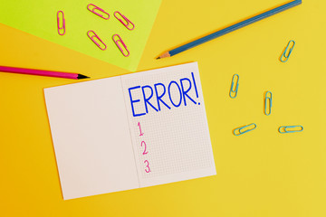 Writing note showing Error. Business concept for state or condition of being wrong in conduct judgement or program Blank squared notebook pencils markers paper sheet colored background