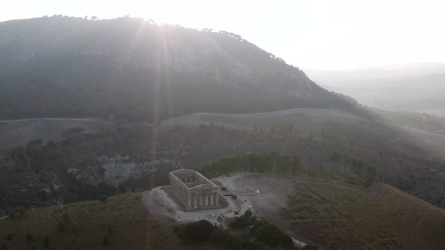 Aerial view of ancient temple standing on the high hill in Athens in Greece. Action. Temple of Olympian is also known as the Columns of the Olympian Zeus.