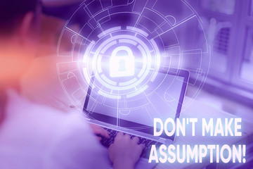 Conceptual hand writing showing Don T Make Assumption. Concept meaning something that you assume to be case even without proof Picture photo network scheme with modern smart device