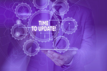 Conceptual hand writing showing Time To Update. Concept meaning this is right moment to make something more modern new Picture photo network scheme with modern smart device