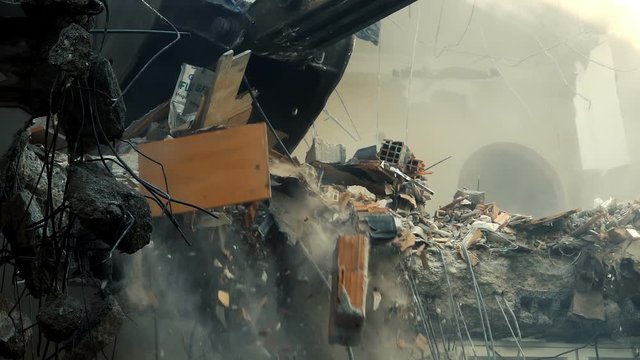 Destroying Old House With Bulldozer Mechanical Arm