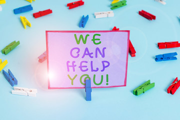 Writing note showing We Can Help You. Business concept for offering good assistance to customers or friends Colored clothespin papers empty reminder blue floor officepin