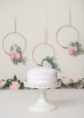 Light Pink Cake with Florals and Greenery