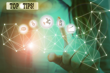 Writing note showing Top Tips. Business concept for small but particularly useful piece of practical advice Picture photo system network scheme modern smart device