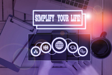 Conceptual hand writing showing Simplify Your Life. Concept meaning focused on important and let...