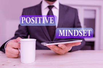 Writing note showing Positive Mindset. Business concept for mental attitude in wich you expect favorable results Male human wear formal clothes present use hitech smartphone