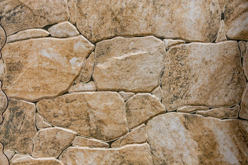 Beige and brown stone texture wall, bricks, template, background with copy space