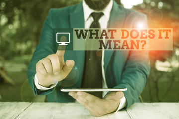 Conceptual hand writing showing What Does It Mean question. Concept meaning intended to communicate...