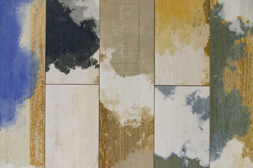 multi-colored wood texture, black, white, beige, yellow and blue tiles, ceramics background