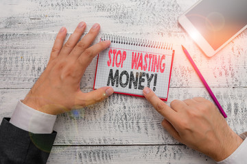 Text sign showing Stop Wasting Money. Business photo text advicing demonstrating or group to start...
