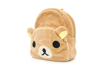 One brown plush toy child backpack side closeup isolated on white background