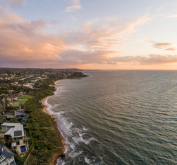 Aerial view of beautiful coastline of Port Phillip Bay in Melbourne, Australia at sunset
