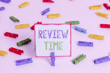 Word writing text Review Time. Business photo showcasing to think or talk about something again Set schedule to review Colored clothespin papers empty reminder white floor background office