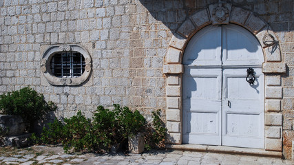 window in stone wall