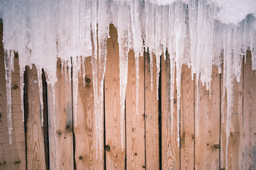 old wooden fence and ice 