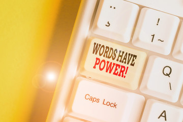Conceptual hand writing showing Words Have Power. Concept meaning as they has ability to help heal hurt or harm someone White pc keyboard with note paper above the white background