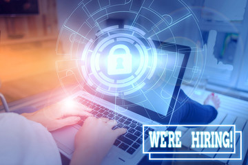 Conceptual hand writing showing We Re Hiring. Concept meaning recently employ someone or pay someone to do particular job Picture photo system network scheme modern smart device