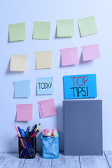 Conceptual hand writing showing Top Tips. Concept meaning small but particularly useful piece of...