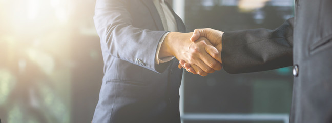 successful negotiate and handshake concept, two businessman shake hand with partner to celebration partnership and teamwork, business deal - obrazy, fototapety, plakaty