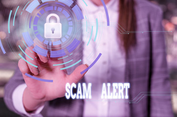 Writing note showing Scam Alert. Business concept for unsolicited email that claims the prospect of...