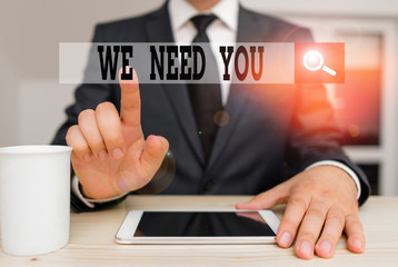 Conceptual hand writing showing We Need You. Concept meaning to fulfill the needs of the assignment duty or obligation Male human wear formal clothes present use hitech smartphone