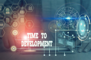 Writing note showing Time To Development. Business concept for a length of time during which a company grows or develop Picture photo network scheme with modern smart device