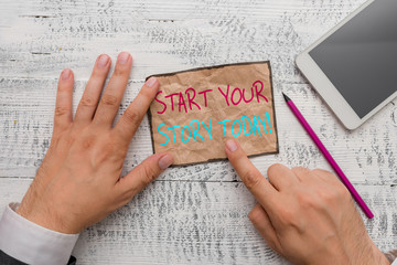 Handwriting text writing Start Your Story Today. Conceptual photo work hard on yourself and begin from this moment Hand hold note paper near writing equipment and modern smartphone device