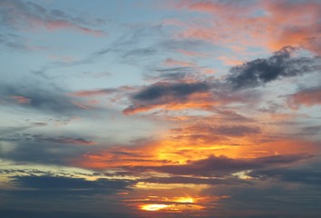 Beautiful fiery orange sunset in the sky, natural background