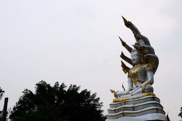 Beautiful thai temple decorated with sculptures an gold