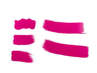 set of pink paint brush strokes on white background 