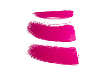set of pink paint brush strokes on white background 