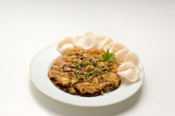 Tahu Telur/Fried Egg Tofu Javanese bean curd omelette with bean sprouts, peanuts and savory soy sauce.