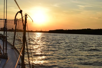 Sunset sailing on the river