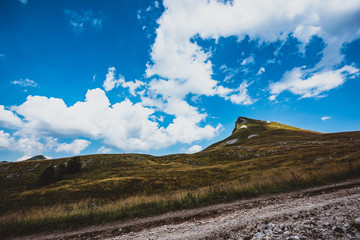 road in mountains and blue sky 