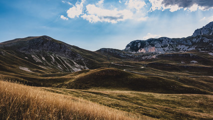 landscape with mountains and clouds