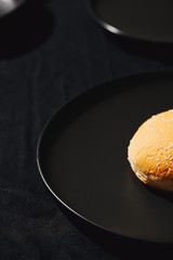 Process making of burger, step by step isolated on black background. Burger wide banner. Split burger. Burger divided in parts