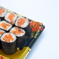 Sushi Roll with salmon on the white background .Food abstract background