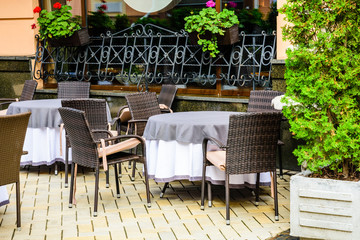 Chairs and tables in a cozy street cafe