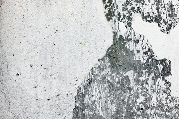 Texture of a concrete wall with cracks and scratches which can be used as a background